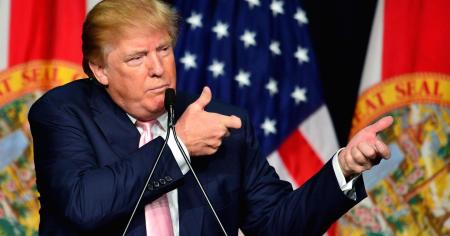 Trump golfs with high-powered rifles in bag